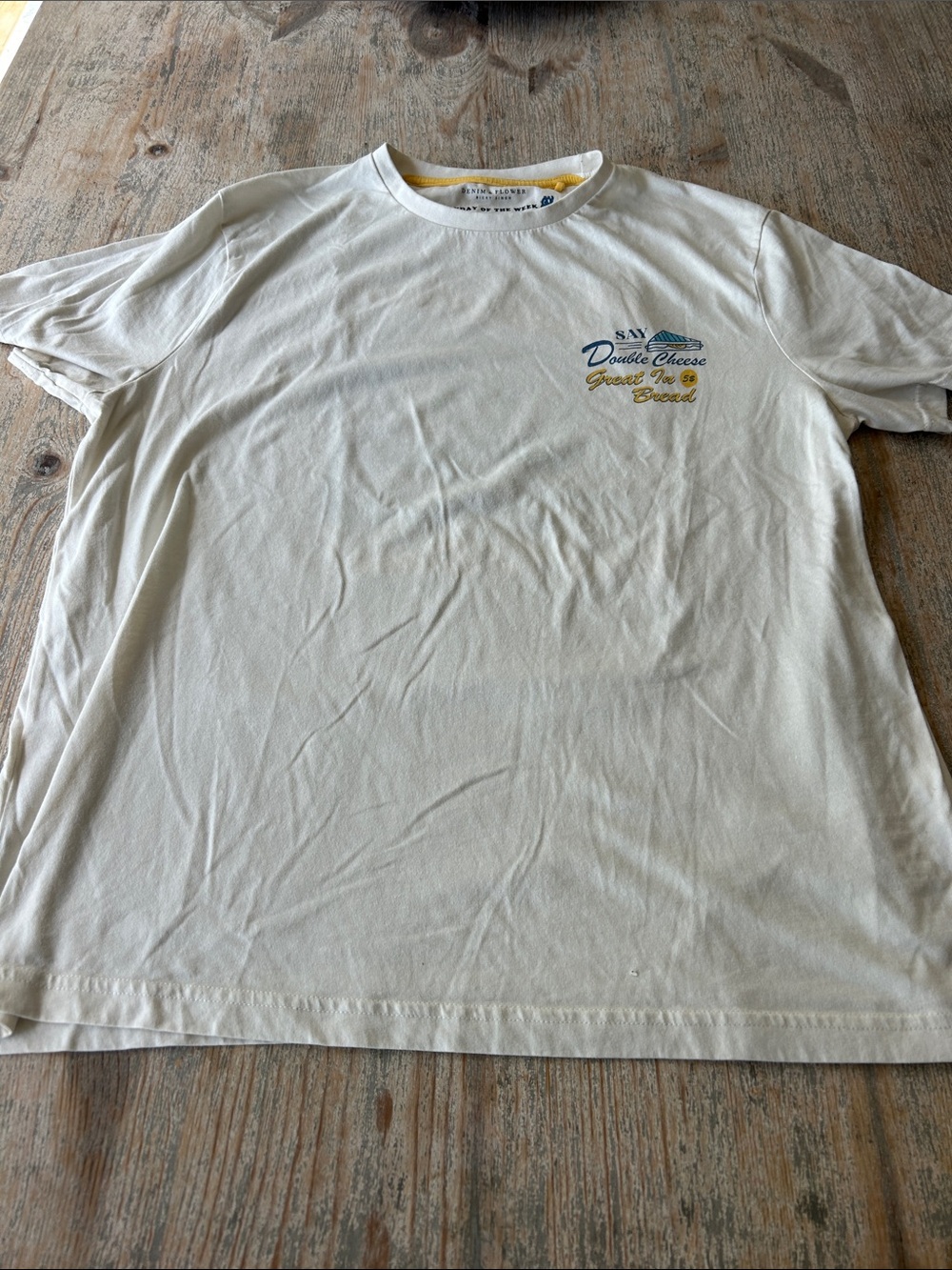 Denim & Flower Cream Crewneck Tee with Small Chest Graphic in Blue and Gold